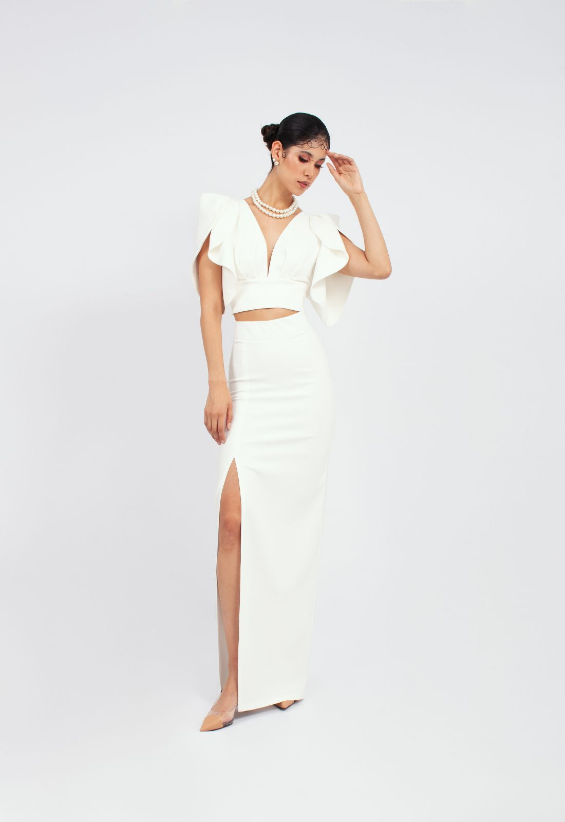 Falda recta elegante con abertura en la pierna derecha